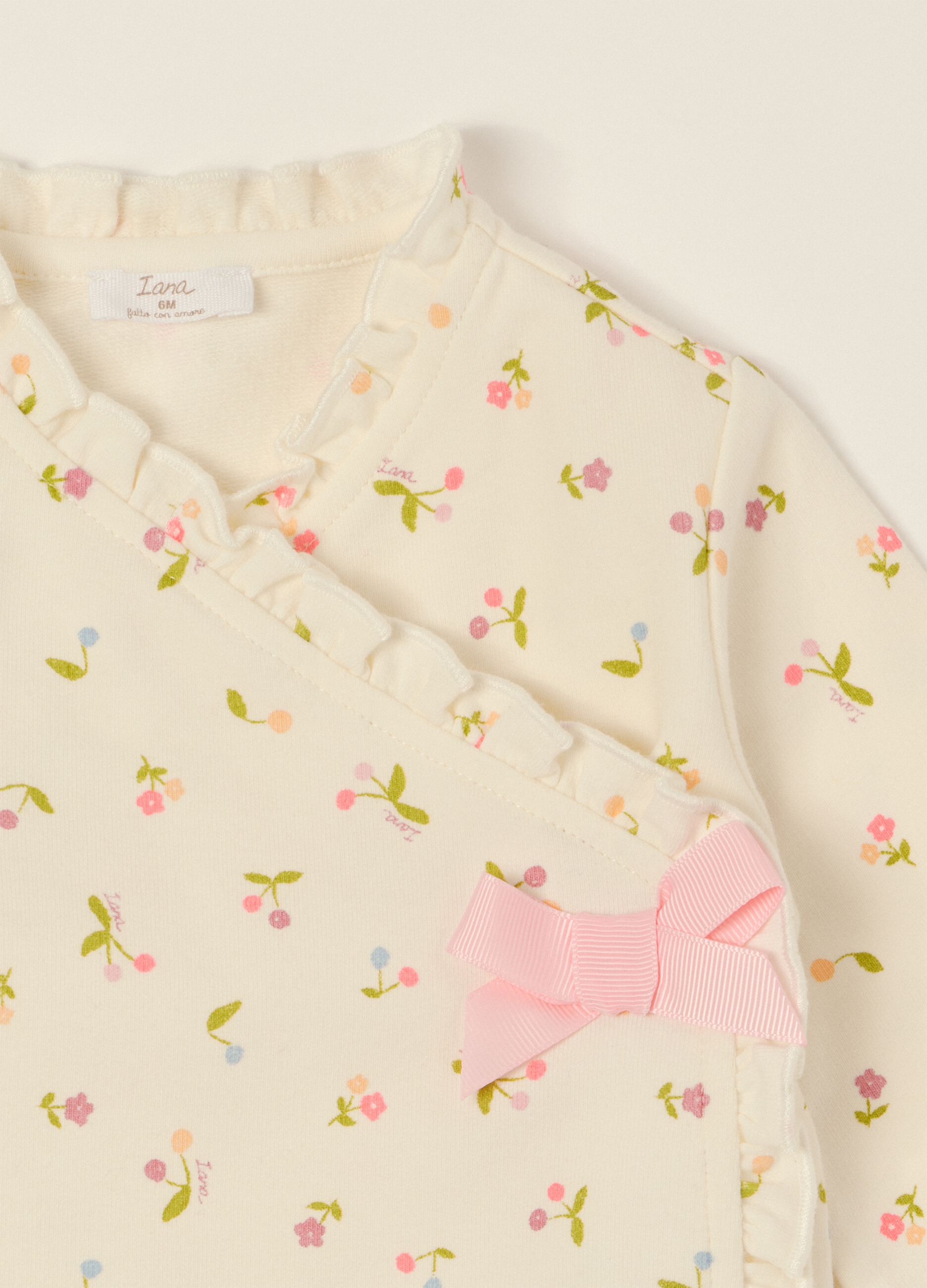 Conjunto para beb&eacute; menina em algod&atilde;o el&aacute;stico multicolor com motivos florais